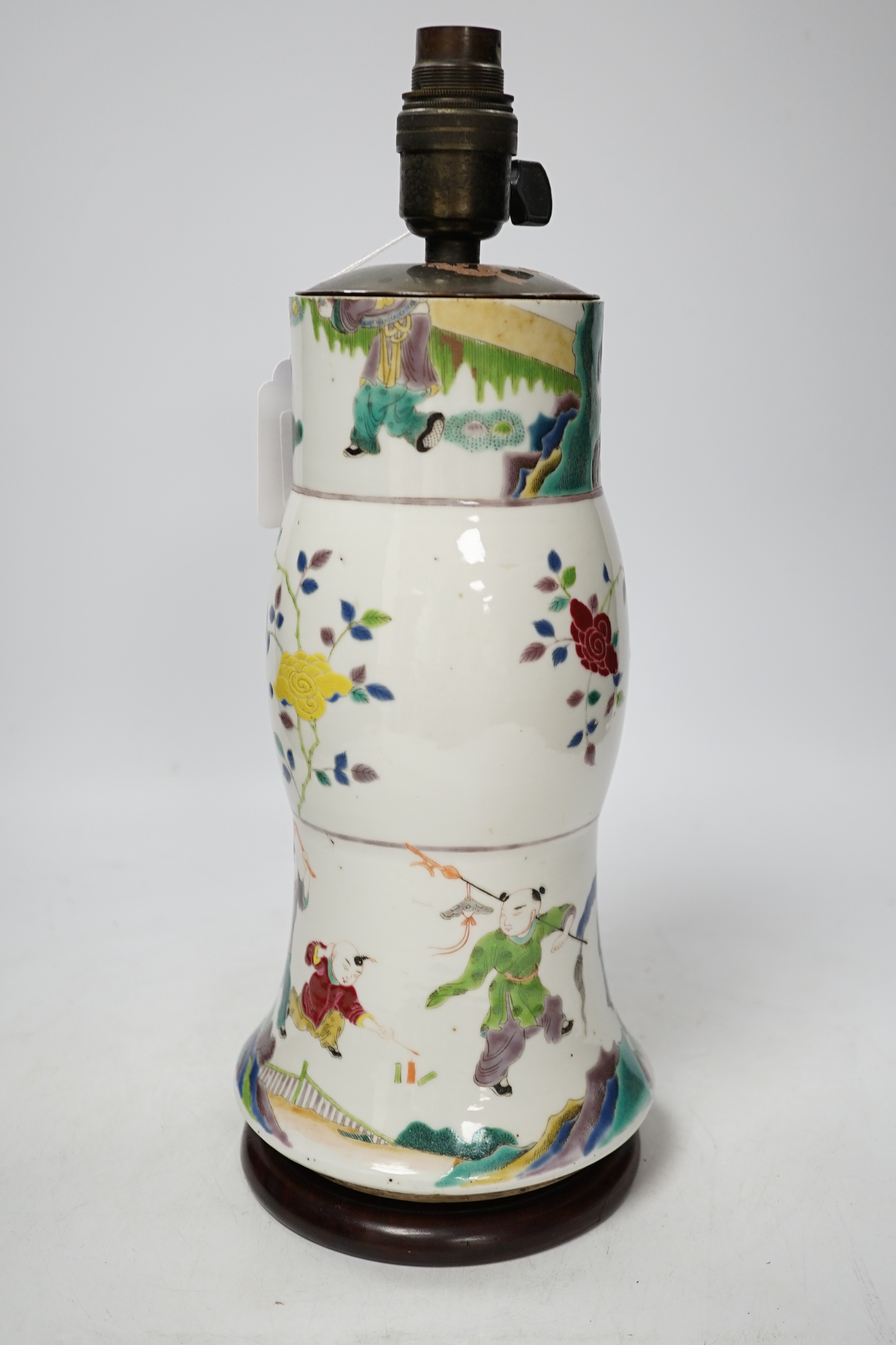 An early 19th century Chinese famille rose gu vase, converted to a lamp, reduced, apocryphal Kangxi mark, overall 35cm high